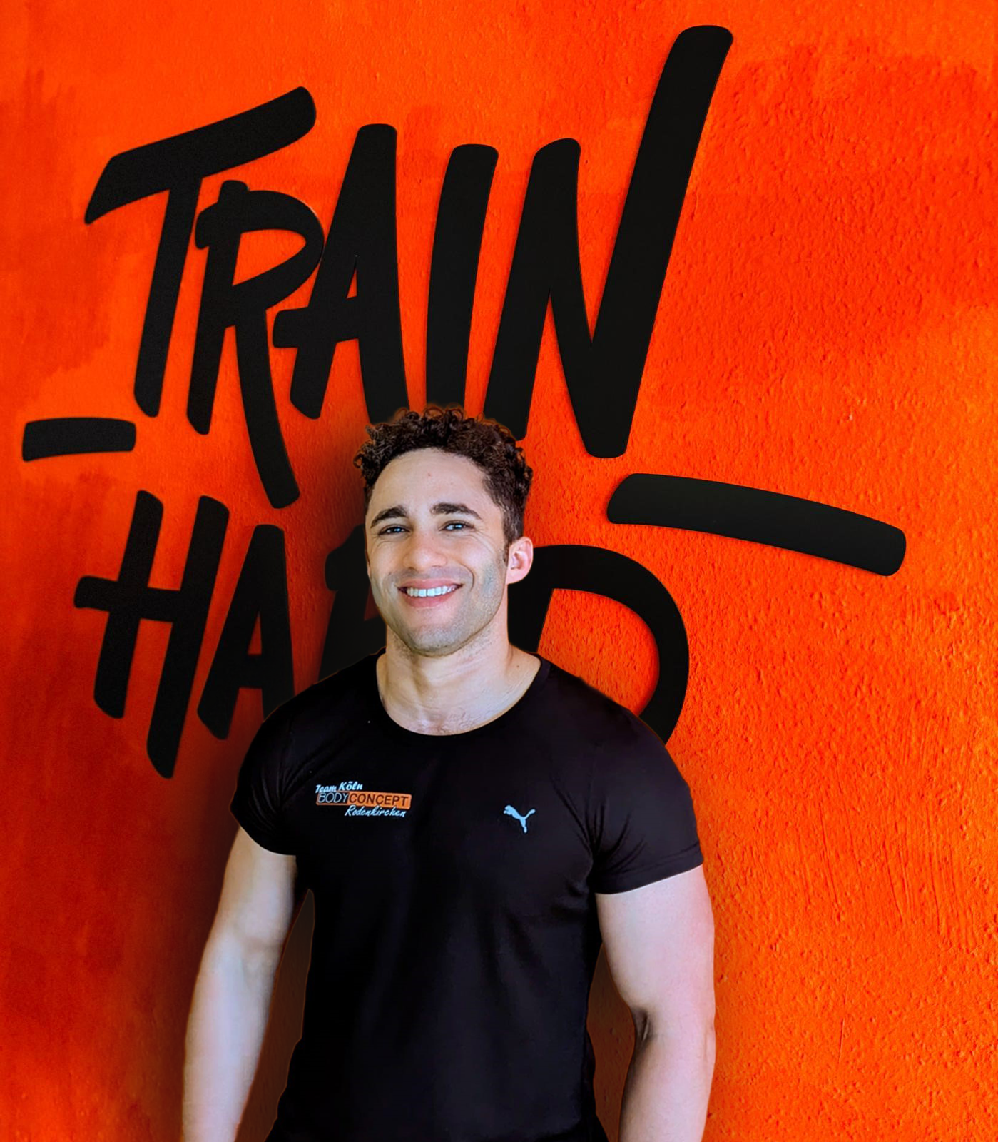 Mitarbeiter TJ von Bodyconcept for der Want mit Train Hard.